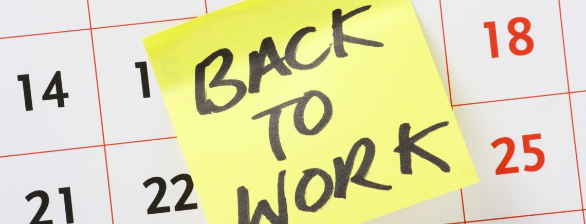 Back to Work reminder on a wall calendar